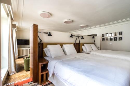 - une chambre avec 2 lits sur un yacht dans l'établissement Pied A Terre Palestro, à Paris