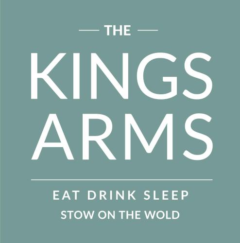 a book cover for the kings arms eat drink sleep snow on the wolf at The Kings Arms Hotel in Stow on the Wold