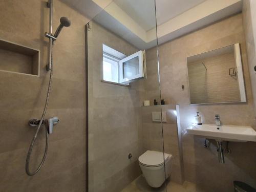 Ένα μπάνιο στο Apartmani Melanie