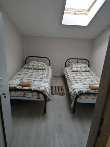 Postel nebo postele na pokoji v ubytování Gelena