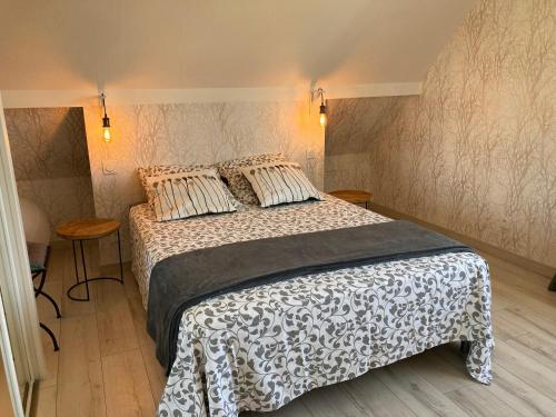 Katil atau katil-katil dalam bilik di Instant d'Evasion