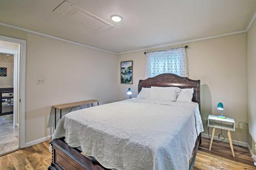 a bedroom with a large bed and a window at Near Natl Park Hollywood Park Hot Springs Home in Hot Springs