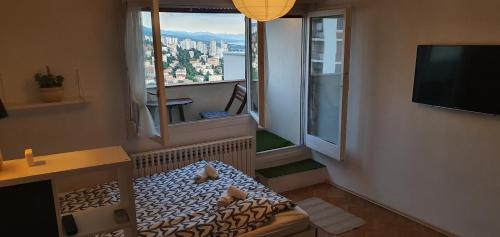 Et tv og/eller underholdning på City Lights Penthouse