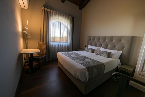Voodi või voodid majutusasutuse La Torricella Case Vacanze Appartamenti toas