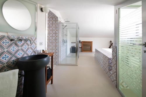 a bathroom with a sink and a mirror at Hotel Nice in Sorrento