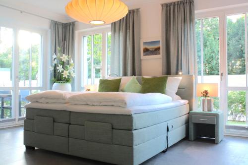 Postel nebo postele na pokoji v ubytování Logierhaus Friedrich WE 01 - "Beachhouse No 1"