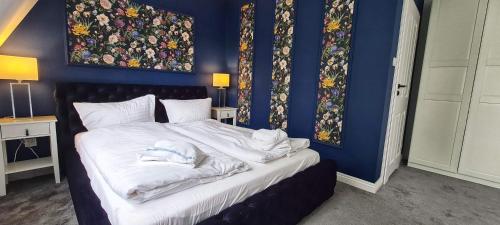Ένα ή περισσότερα κρεβάτια σε δωμάτιο στο Monte Carlo Boutique Hotel