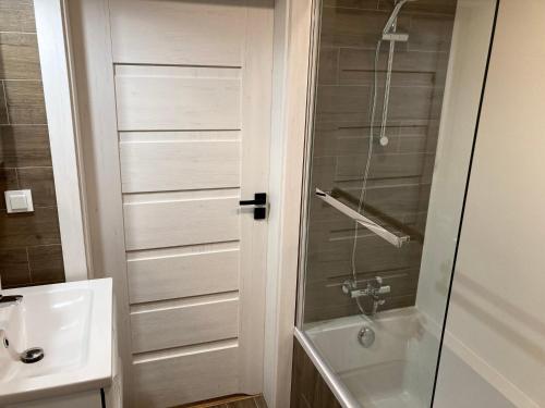 Ванная комната в Apartament Łagiewniki