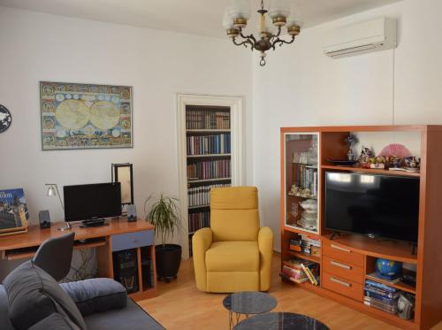 TV a/nebo společenská místnost v ubytování Diadora