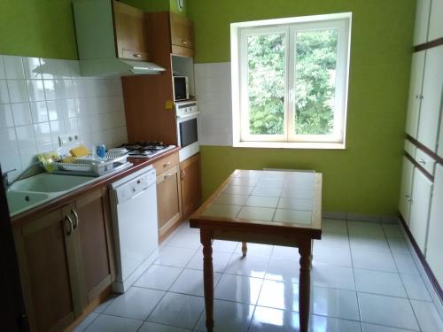 A kitchen or kitchenette at Gite de la douane