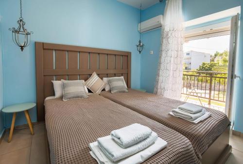 Postel nebo postele na pokoji v ubytování Lena Apartments II