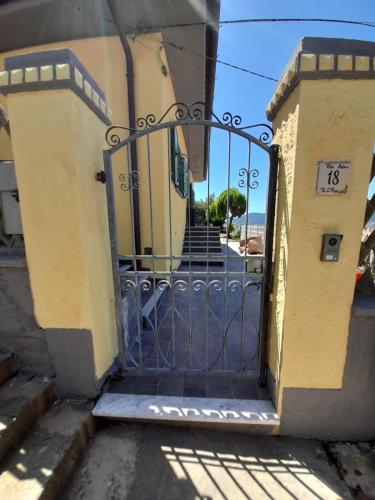 an entrance to a building with a gate at Atena in La Spezia