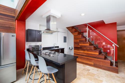 Kuchyň nebo kuchyňský kout v ubytování Condo Terra 13 by Kivoya