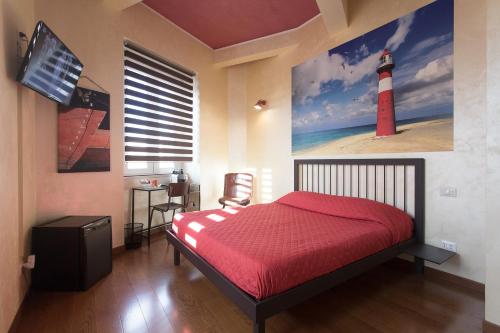 Letto o letti in una camera di BB SAVOIA Affittacamere