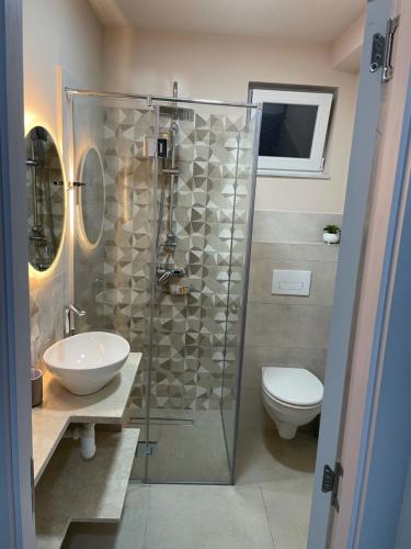 Bilik mandi di Apartmani MiS