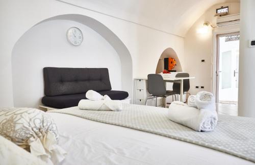 Posteľ alebo postele v izbe v ubytovaní Balilla Guest House - OSTUNI CENTRO - All Confort