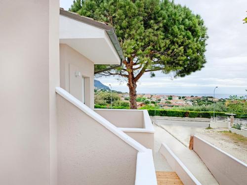 a view from the balcony of a house with a tree at Balconi Del Conero in Numana
