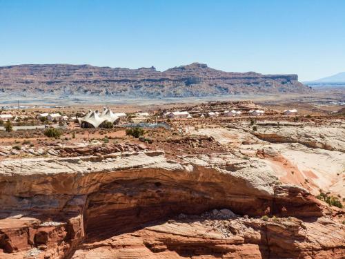 a view of the opera house from the rock formations at Under Canvas Lake Powell-Grand Staircase in Big Water