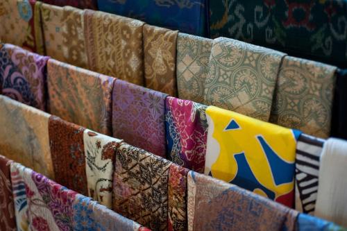 a bunch of different types of ties on display at Komaneka at Monkey Forest Ubud in Ubud