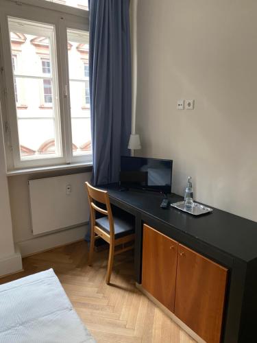 Un ou plusieurs lits dans un hébergement de l'établissement Café & Hotel Knösel