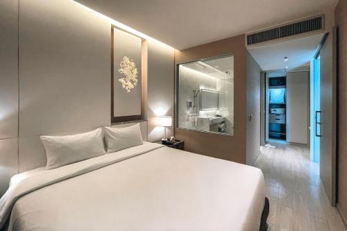 Katil atau katil-katil dalam bilik di Jasmine 59 Hotel
