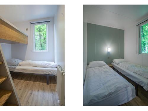 een slaapkamer met 2 bedden en een raam bij Attractive chalet with microwave and close to the forest in Rhenen
