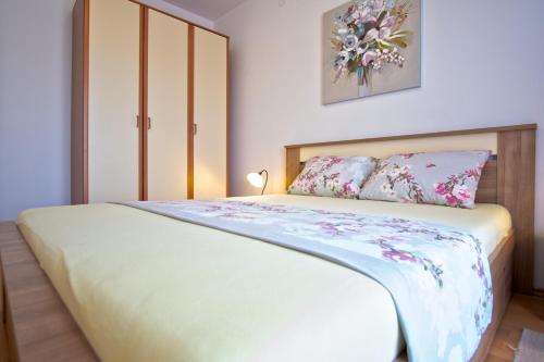 Postel nebo postele na pokoji v ubytování Apartman Luka