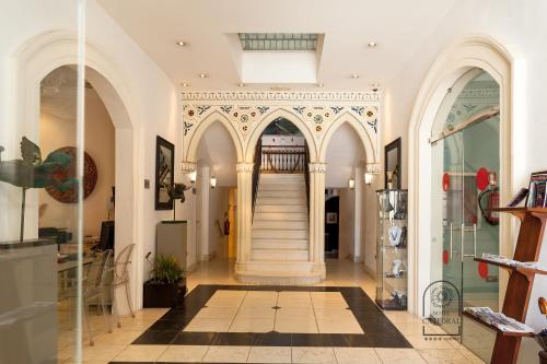 a hallway with a staircase in a building at Catedral Almería in Almería