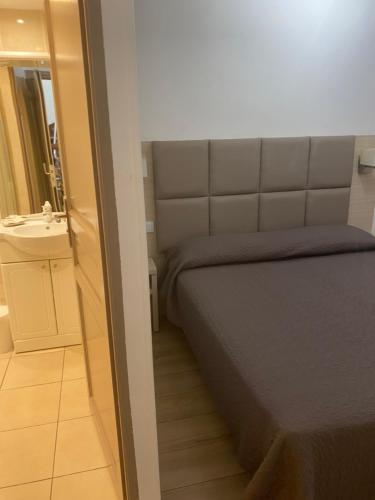 Katil atau katil-katil dalam bilik di Hotel Lutetia