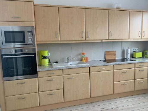 Kuchyň nebo kuchyňský kout v ubytování Ferienwohnung Maximilian