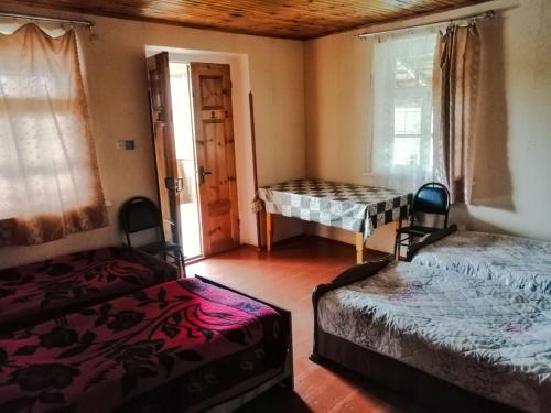Tempat tidur dalam kamar di Guesthouse Sagrila