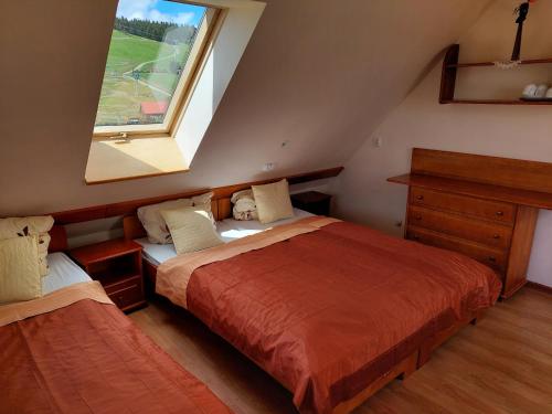 Posteľ alebo postele v izbe v ubytovaní Agal Zieleniec