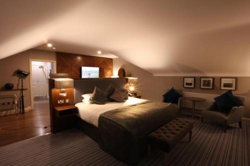 Voodi või voodid majutusasutuse Vaughan Lodge Hotel toas