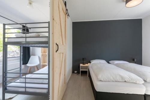 Postel nebo postele na pokoji v ubytování Effe Sprage - Callantsoog