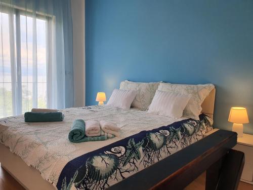 Posteľ alebo postele v izbe v ubytovaní APARTMAN VIDA 2