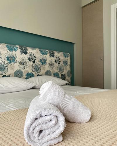 Ένα ή περισσότερα κρεβάτια σε δωμάτιο στο Drimades Blue Rooms
