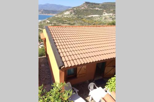 a view of a house with a tile roof at West Sardinia - Bosa in Magomadas