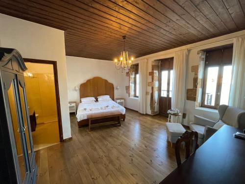 Postel nebo postele na pokoji v ubytování Captain Vasilis Hotel