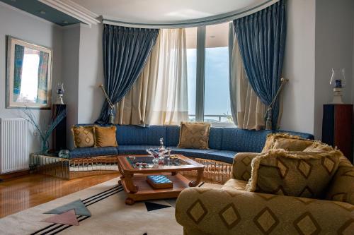 Χώρος καθιστικού στο Villa serenity