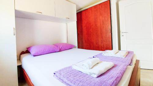 Postel nebo postele na pokoji v ubytování Holiday home - Beach house 'Amarella'