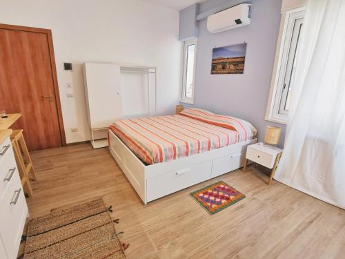 Cama o camas de una habitación en B&B MiraValle Agrigento