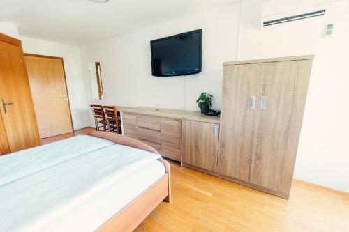 Giường trong phòng chung tại Frankovič Bed&Breakfast
