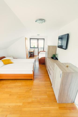 En eller flere senge i et værelse på Frankovič Bed&Breakfast