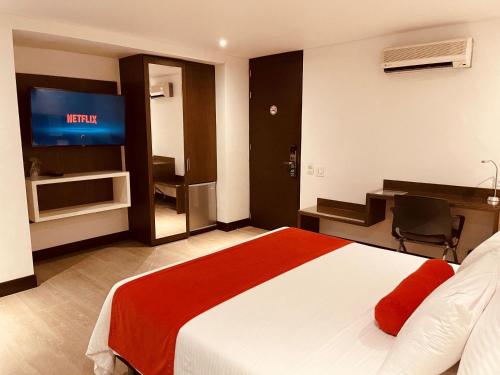 TV a/nebo společenská místnost v ubytování Hotel Loyds