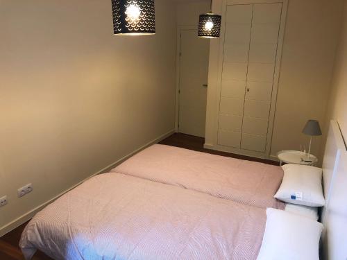 Katil atau katil-katil dalam bilik di Apartamentos Las Margas Golf Formigal Ordesa