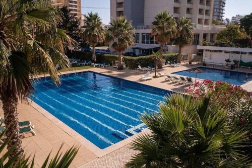 Pemandangan kolam renang di Seaside Luxury Apartment - Praia da Rocha atau berdekatan