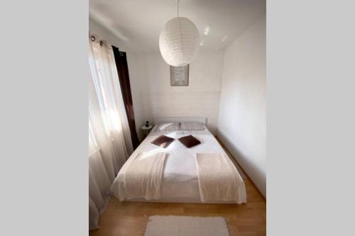 Ένα ή περισσότερα κρεβάτια σε δωμάτιο στο Cozy Apartment Umag