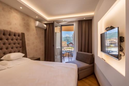 Postel nebo postele na pokoji v ubytování City Apartments