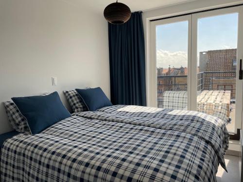 Ένα ή περισσότερα κρεβάτια σε δωμάτιο στο Seaview penthouse