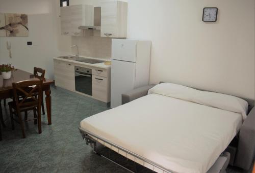 Dapur atau dapur kecil di Minerva casa vacanze